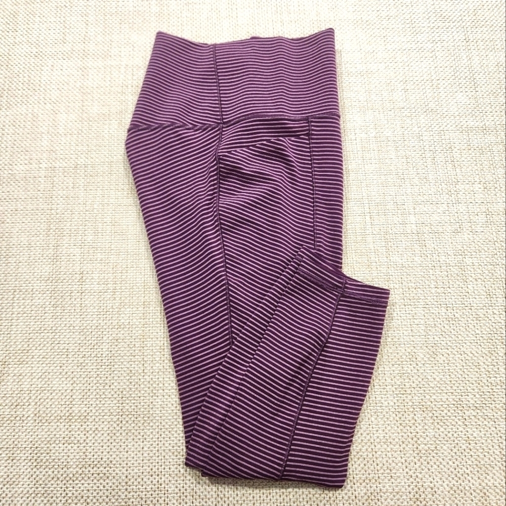 ATHLETA Salutation Stash Pocket II 7/8 Tight Women's Size Small Purple Yoga Gym